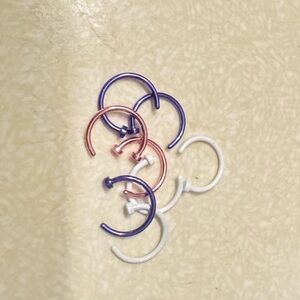Multiple color hoop nose rings